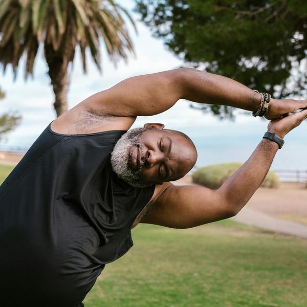 Man in a meditative state after a workout, showing focus and calm.